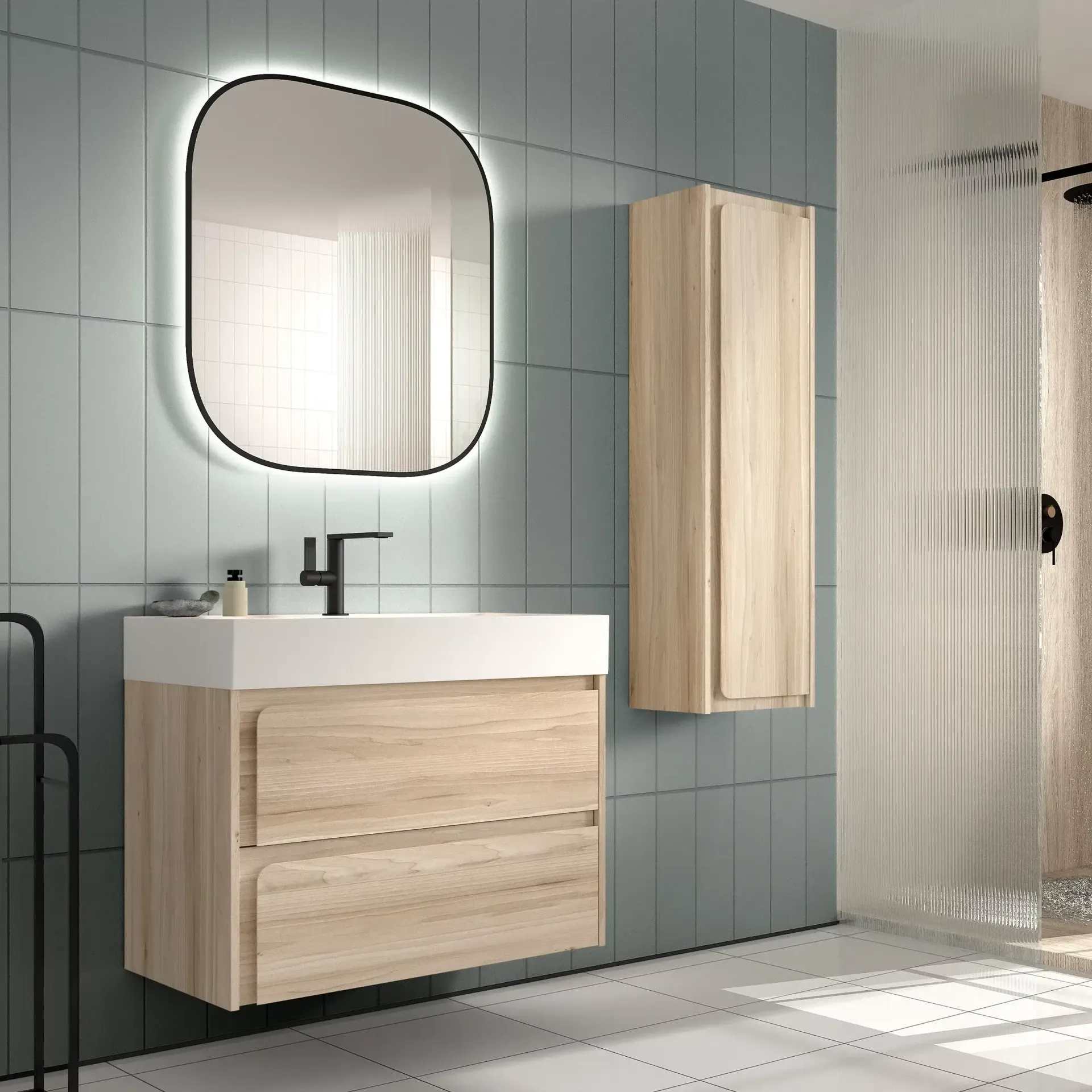 Baño con tocador de madera clara, espejo iluminado, mueble alto y ducha.