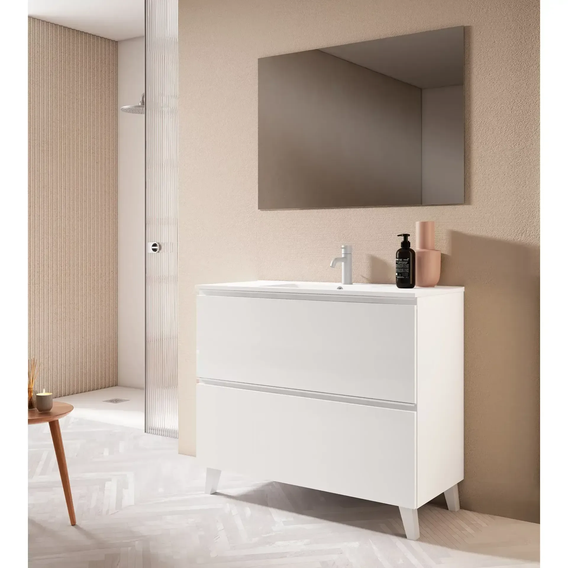 Mueble de baño blanco con dos cajones, espejo y grifo.