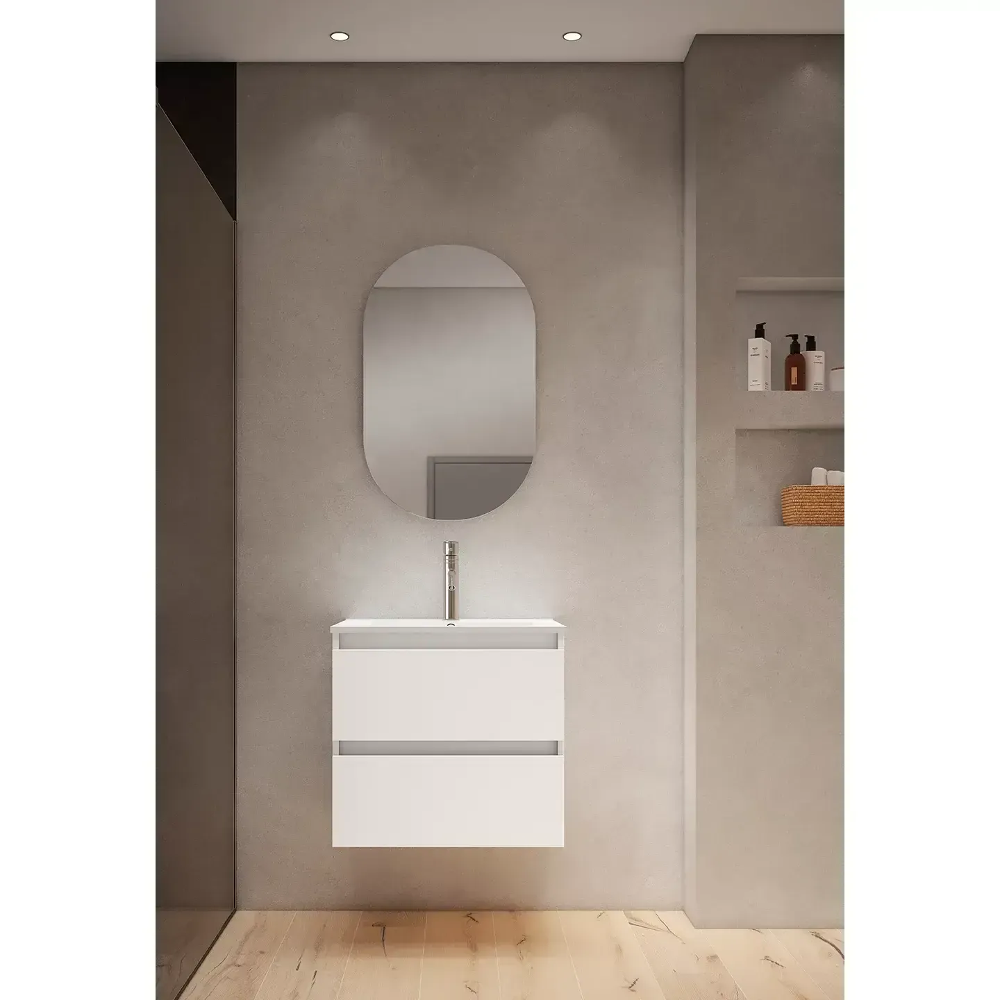 Baño moderno con tocador blanco, espejo ovalado y piso de madera.