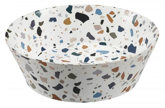 Cuenco de terrazo con fondo blanco y motas de colores.