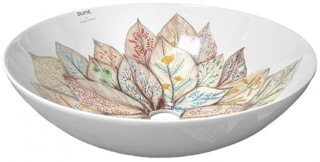 Lavabo de cerámica blanca con diseño de hojas en tonos marrones, verdes y azules.