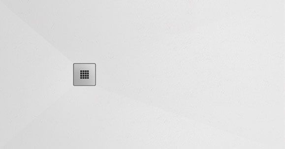 Pared blanca con un pequeño respiradero cuadrado.