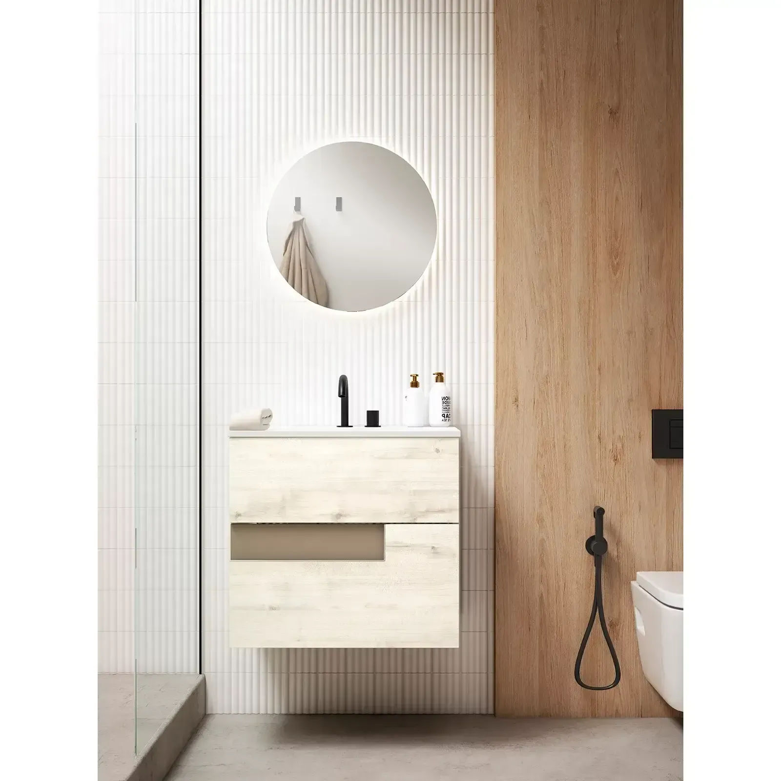 Baño moderno con tocador flotante, espejo redondo y pared revestida de madera.