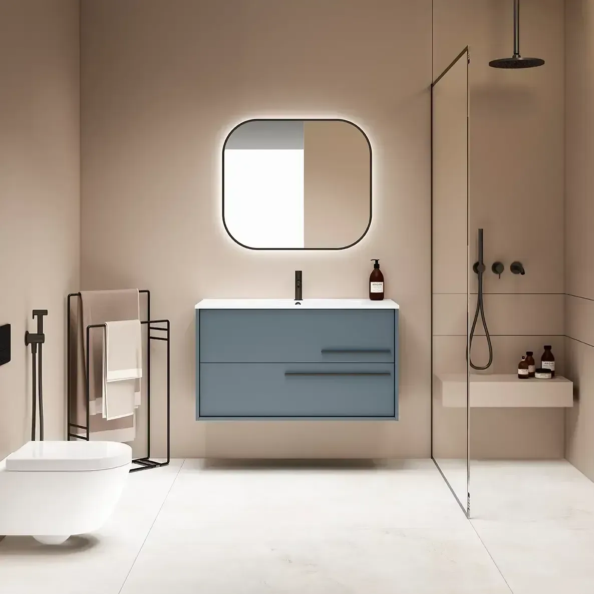 Baño moderno con tocador azul, espejo grande, ducha de cristal e inodoro blanco.