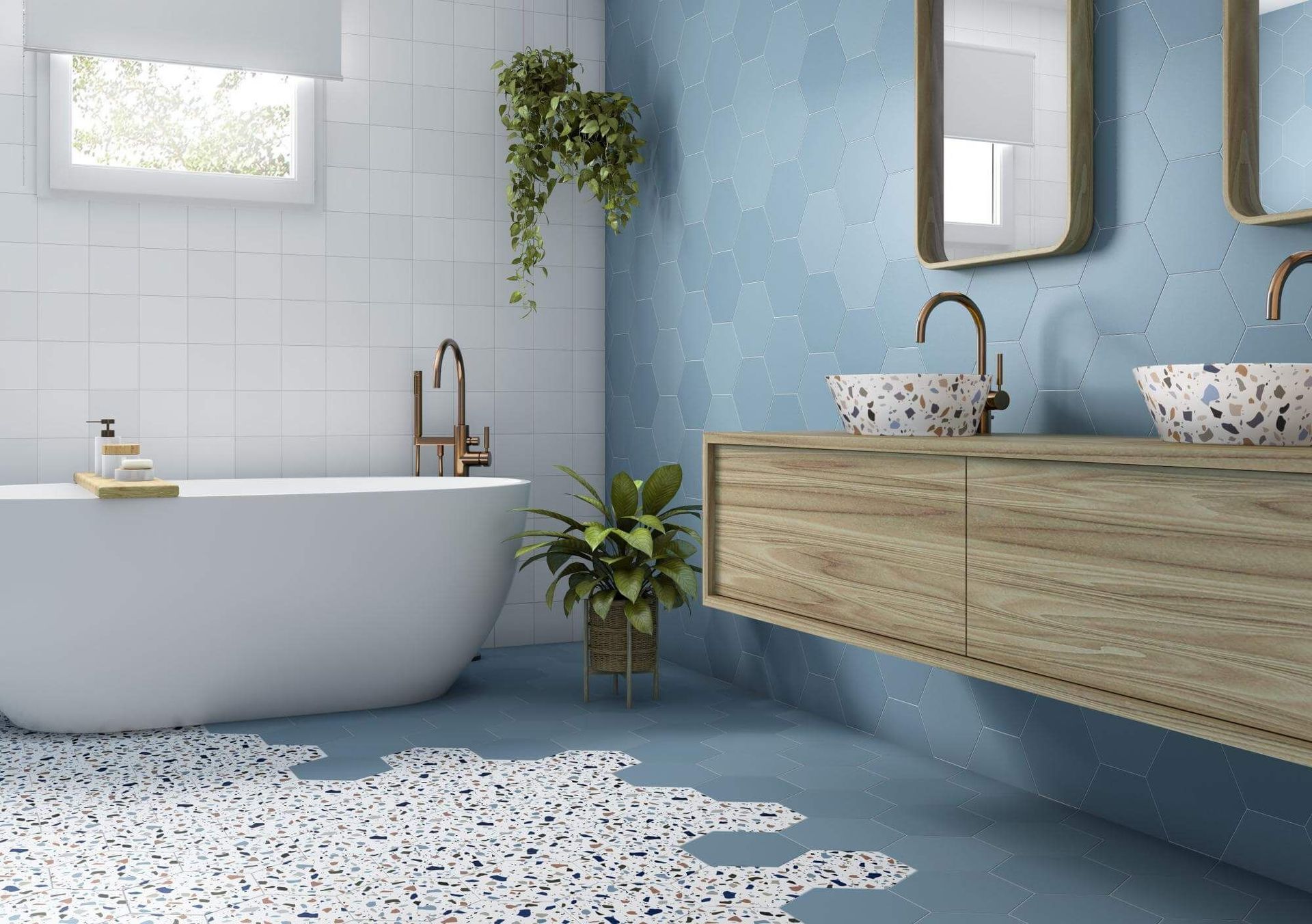 Baño moderno con bañera, tocador flotante de madera y paredes azules.