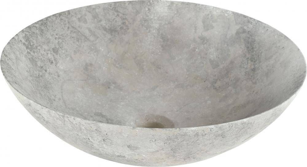 Lavabo de color gris con apariencia de piedra, superficie texturizada, forma ovalada y pequeño orificio de drenaje.