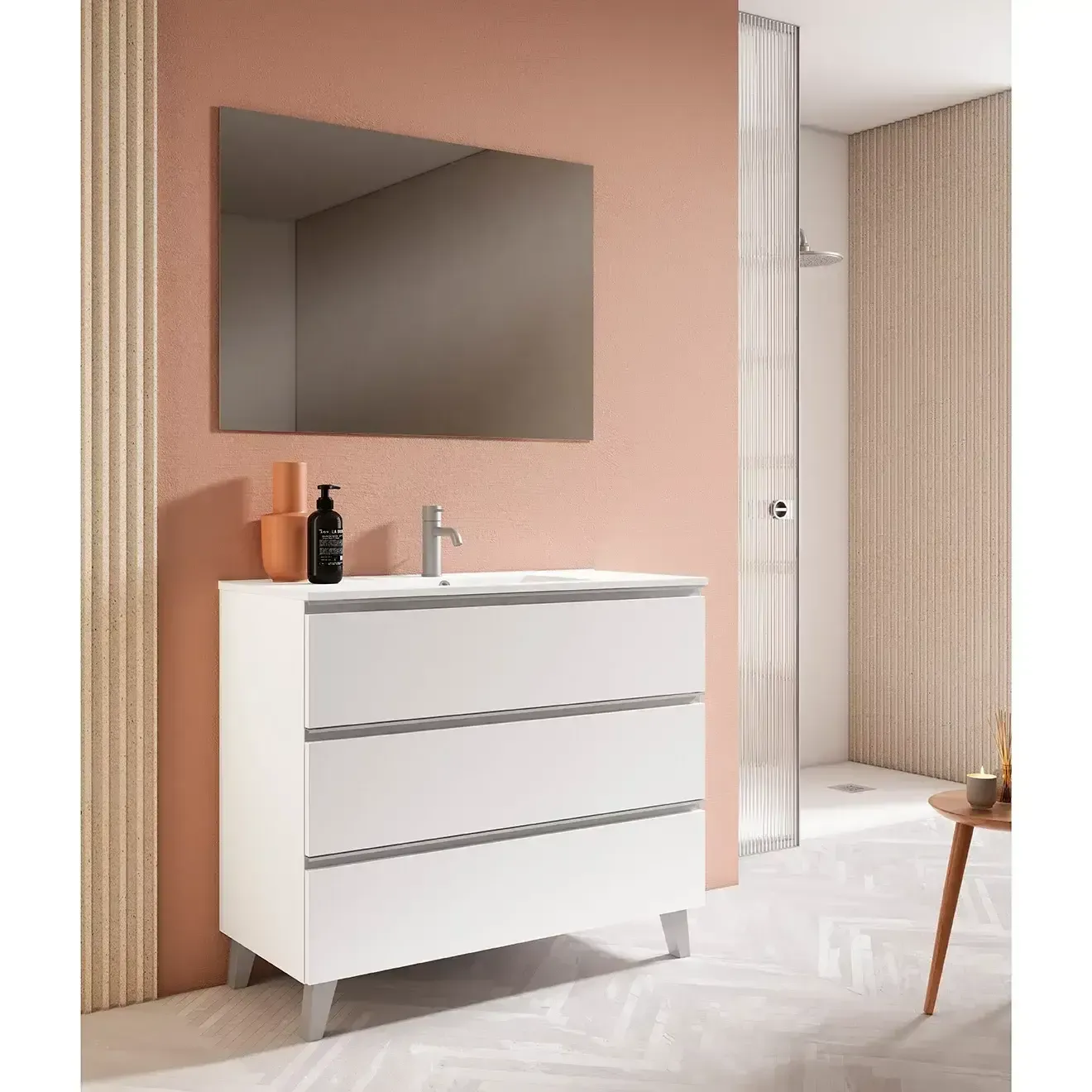 Tocador de baño blanco con cajones, espejo y lavabo en un entorno de baño moderno.