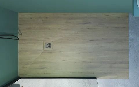 Vista aérea de un piso de ducha con acabado símil madera y un desagüe en el centro.