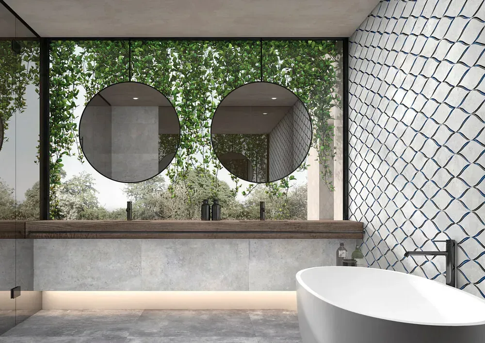 Baño moderno con gran ventanal con vistas a la vegetación, dos espejos circulares y bañera blanca.