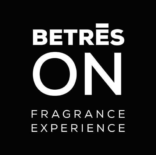 Es un logotipo para una experiencia de fragancia.