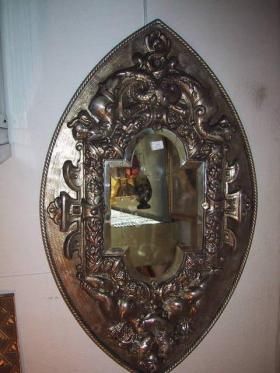 Miroir ancien (19ème) en métal argenté.