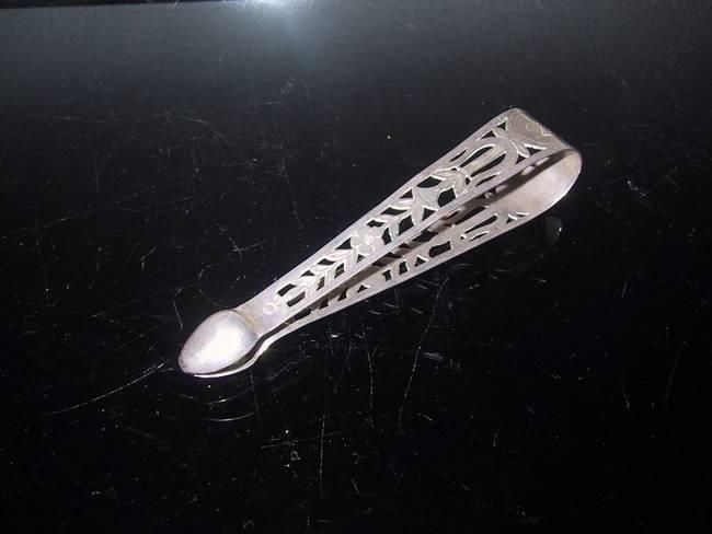 Pince à sucre en argent d'époque Empire.