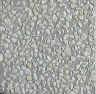 Échantillon béton décoratif, gris et pierres blanches