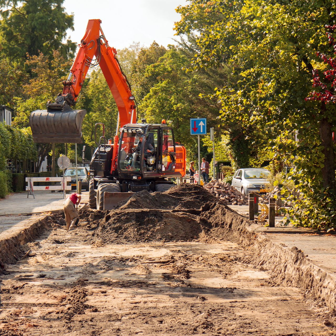 Travaux d'assainissement dans un quartier résidentiel