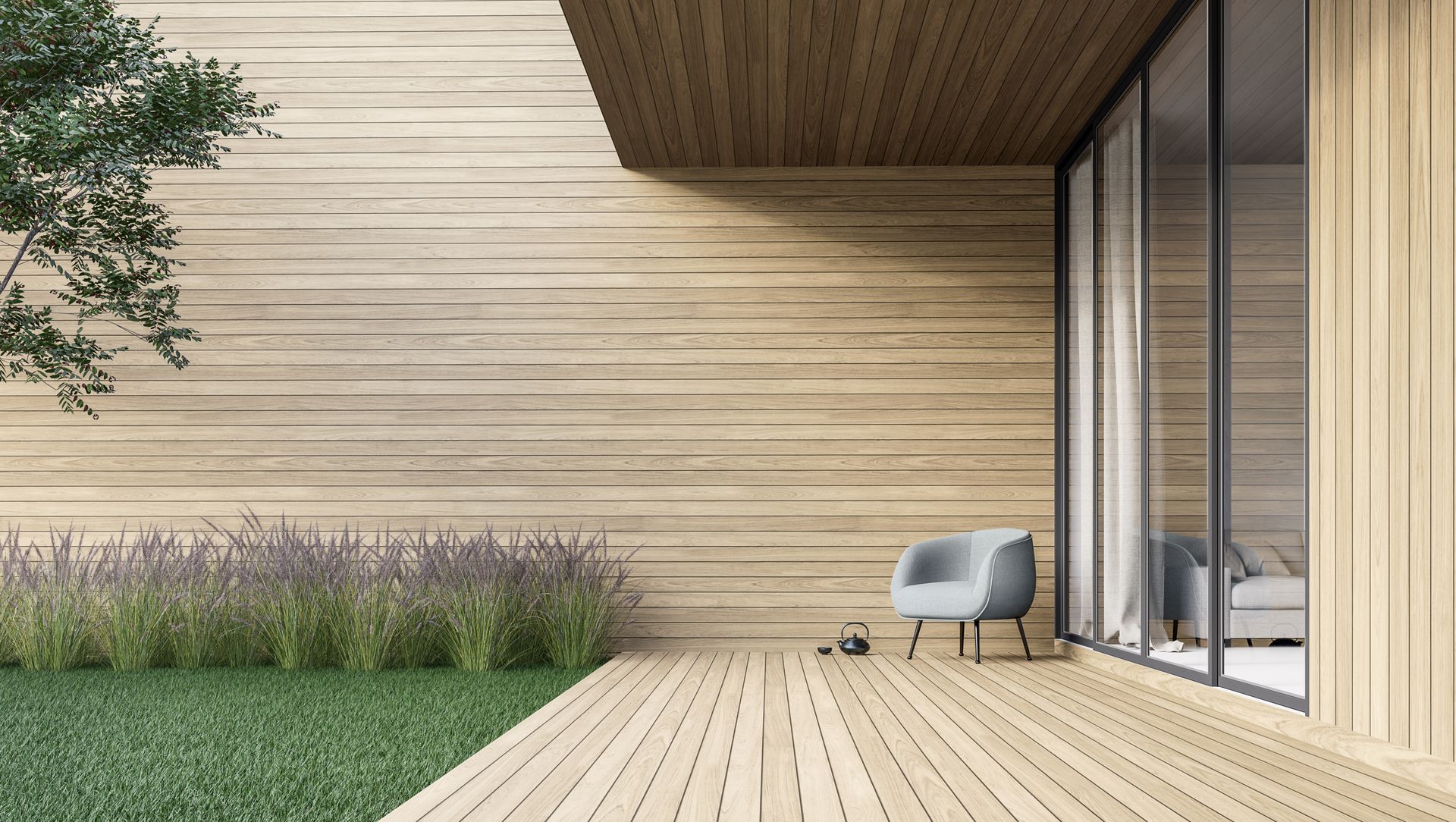 Photo minimaliste d'une terrasse avec un petit fauteuil gris