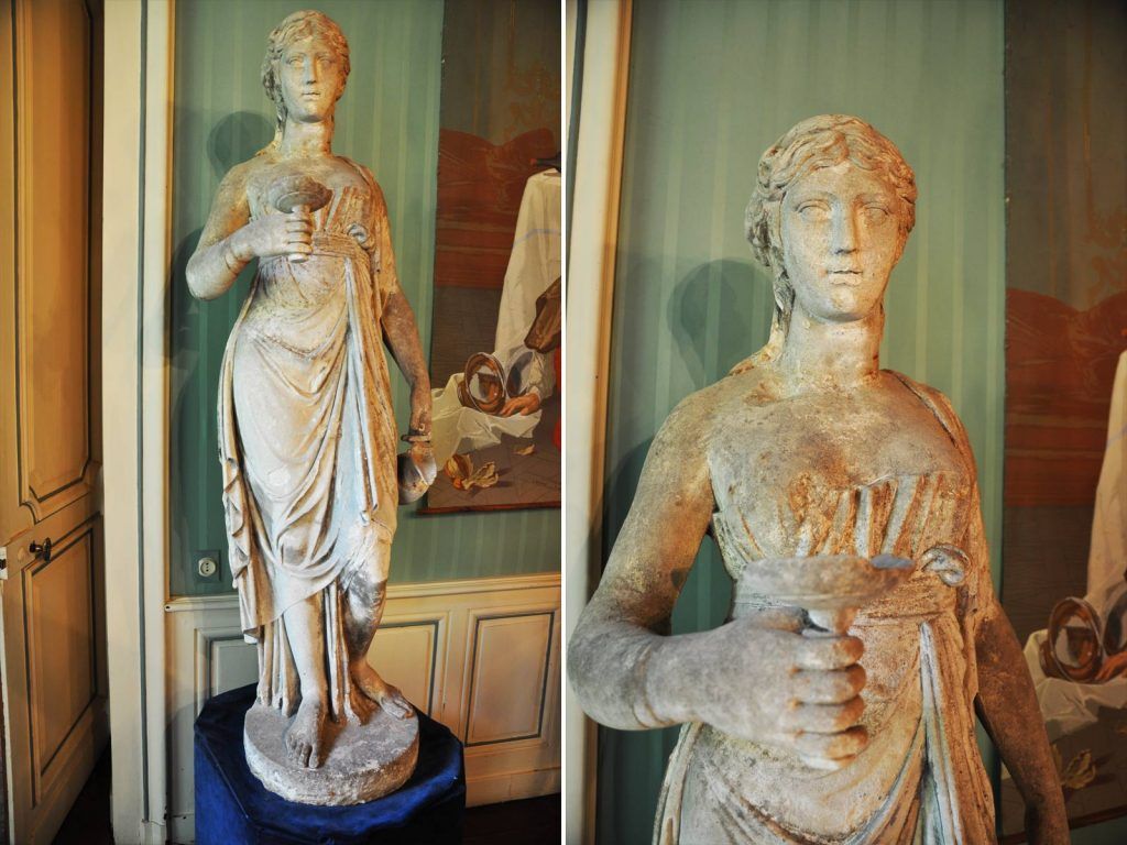 Photo de statue ancienne.