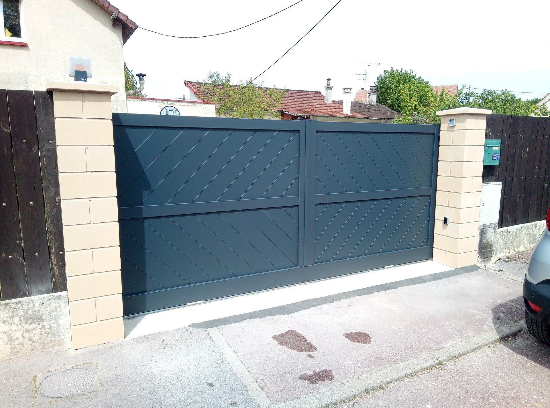 Installation portail battant 