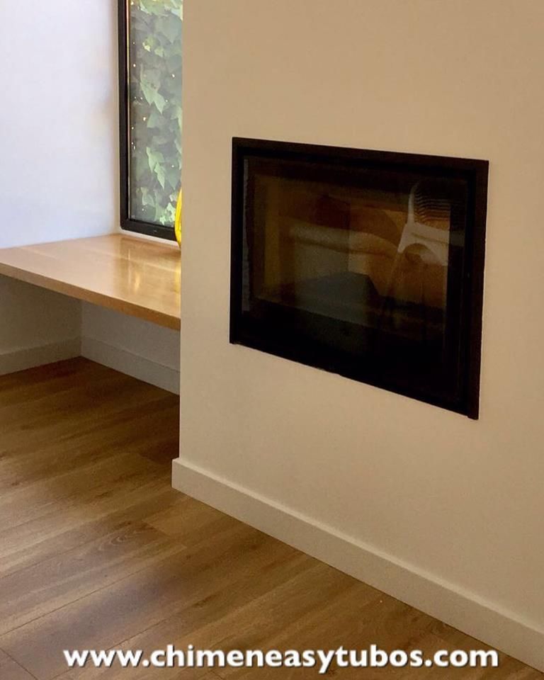 Una foto de una chimenea es de www.chimeneeasytubos.com