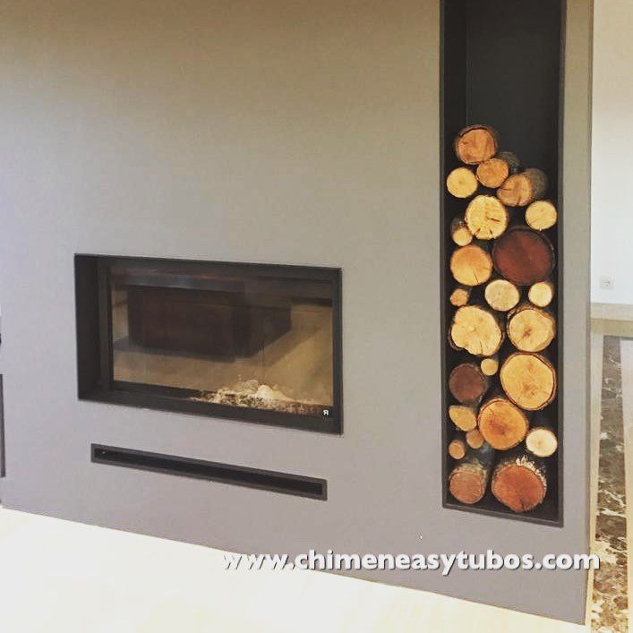 Una imagen de una chimenea con el sitio web www.chimeneasytubos.com en la parte inferior