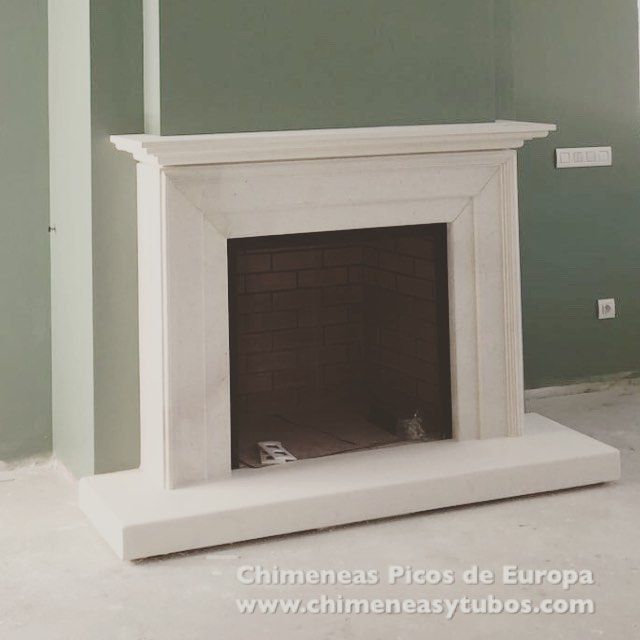 Una chimenea con el sitio web chimeneasytubos.com en la parte inferior