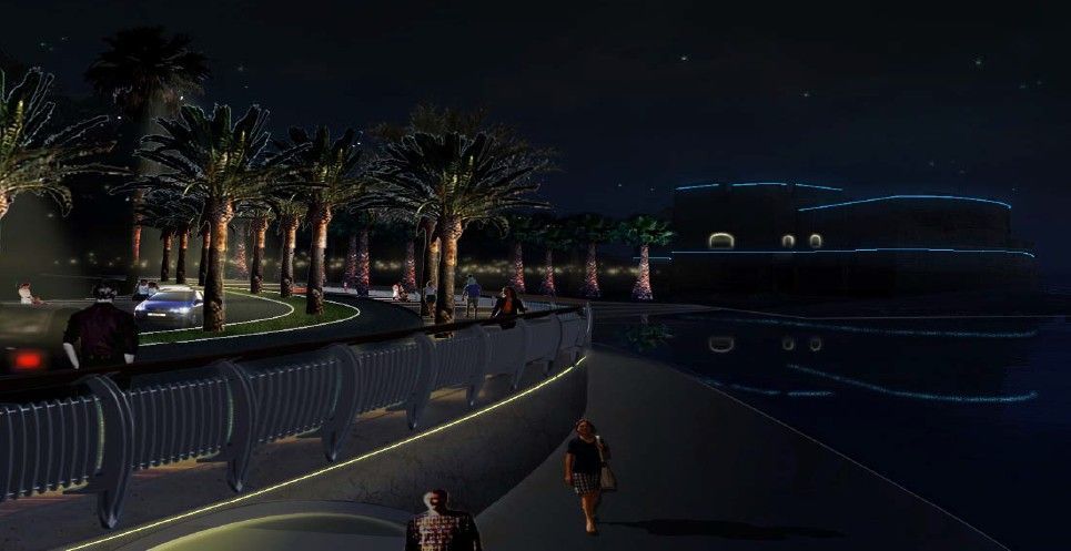 Promenade nocturne en bord de mer avec palmiers, balustrades et quelques personnes marchant sous les réverbères.