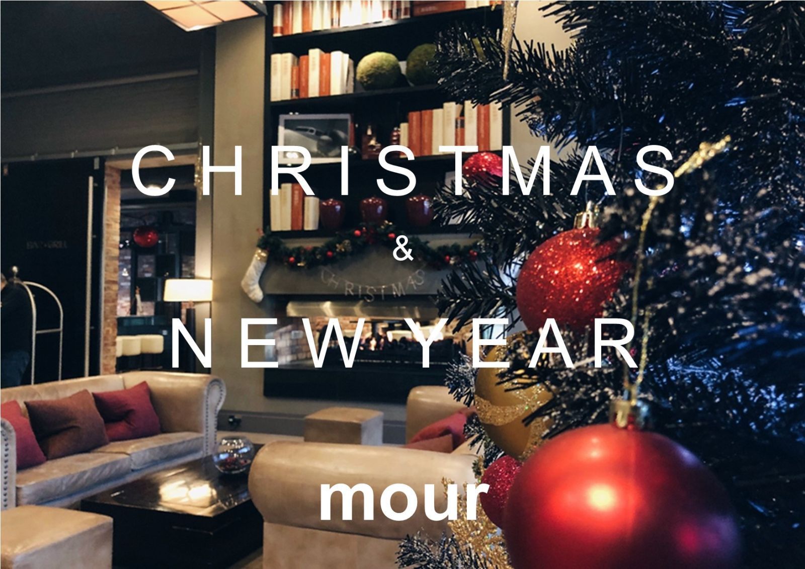 Christmas and New Year decor in a cozy interior setting with a Christmas tree and a sofa.
