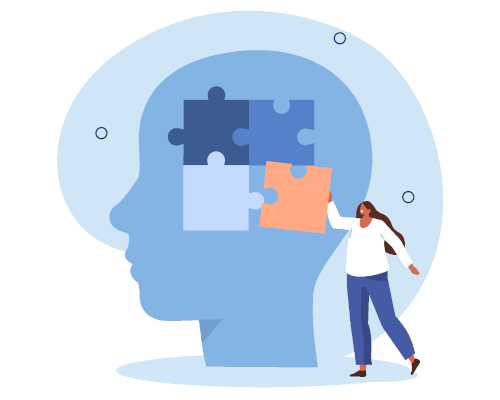 Una persona coloca una pieza de un rompecabezas en la silueta azul