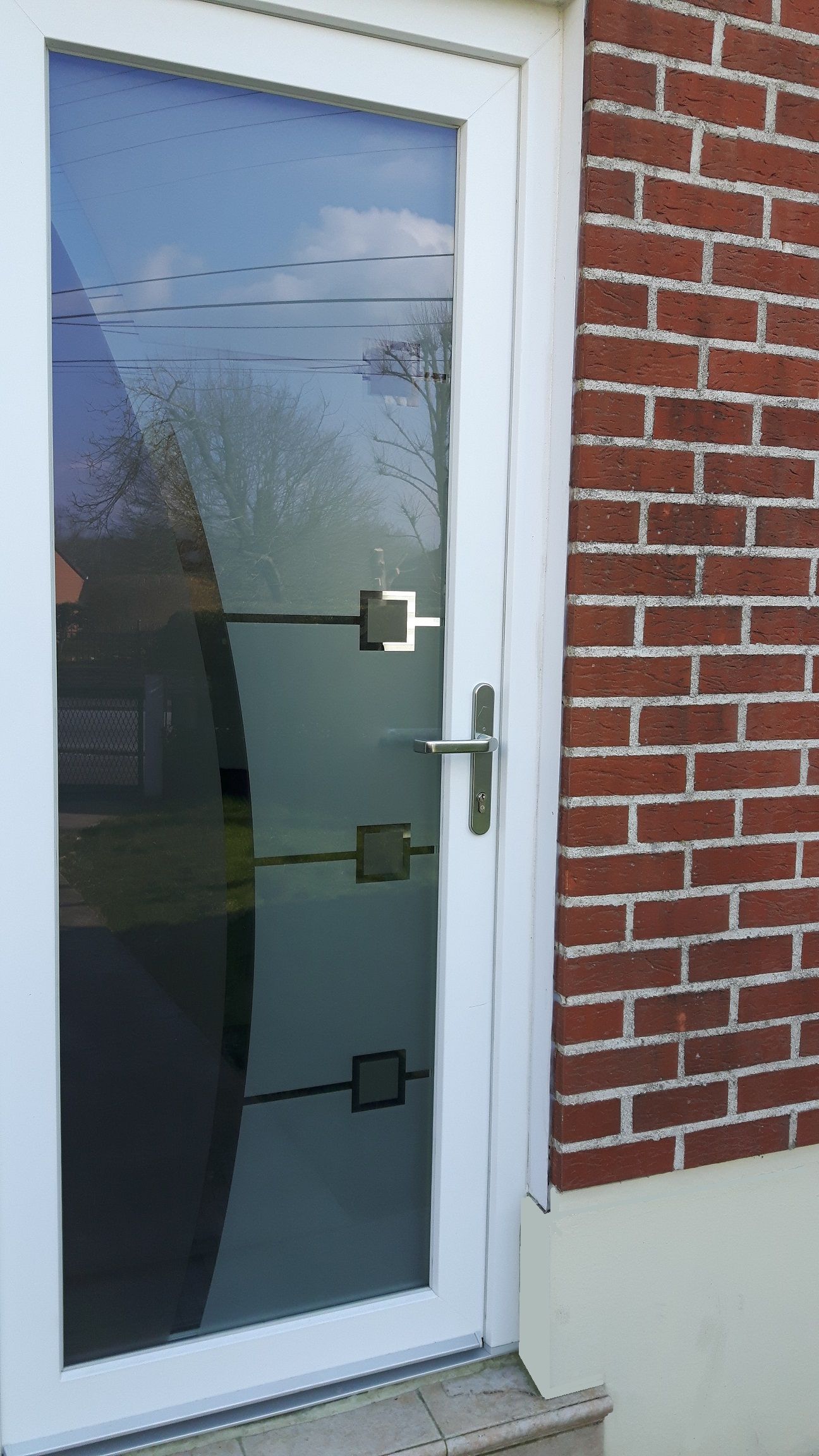 Porte d'entrée en PVC blanc, modèle vitré verrissima. Anti effraction. SELO.