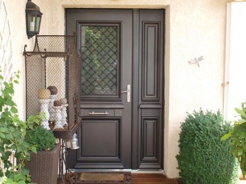 Porte d'entrée avec une partie vitrée  style ancien