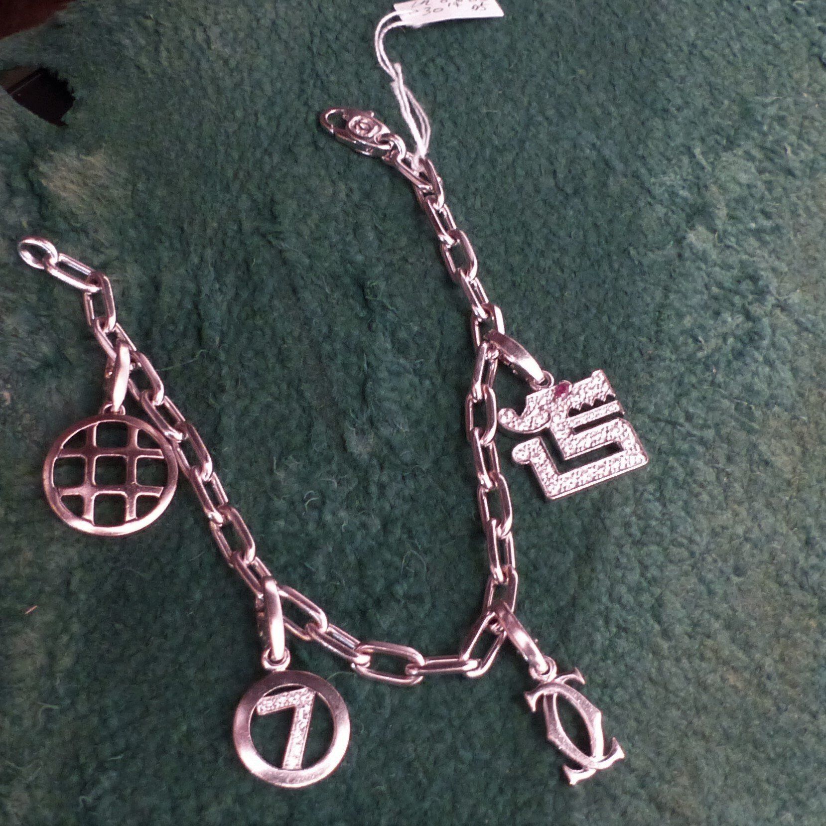 Bracelet Cartier vintage or blanc et diamants avec Charms