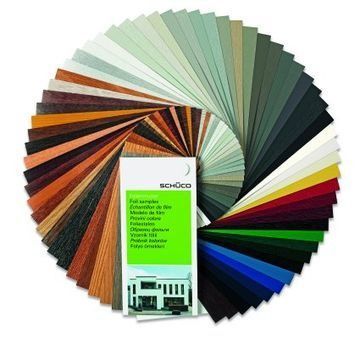 Abanico de muestras de pintura de colores dispuestas en círculo con una tarjeta de muestra en el centro.