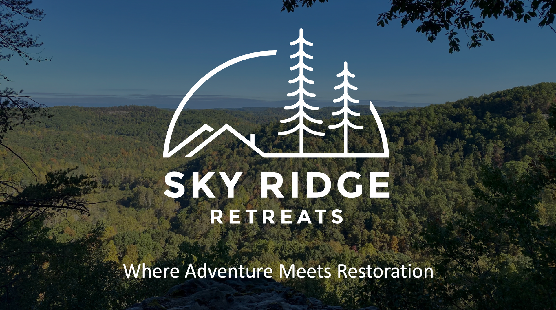 Logo of Sky Ridge Retreats over a mountain landscape: white outline logo with trees, text