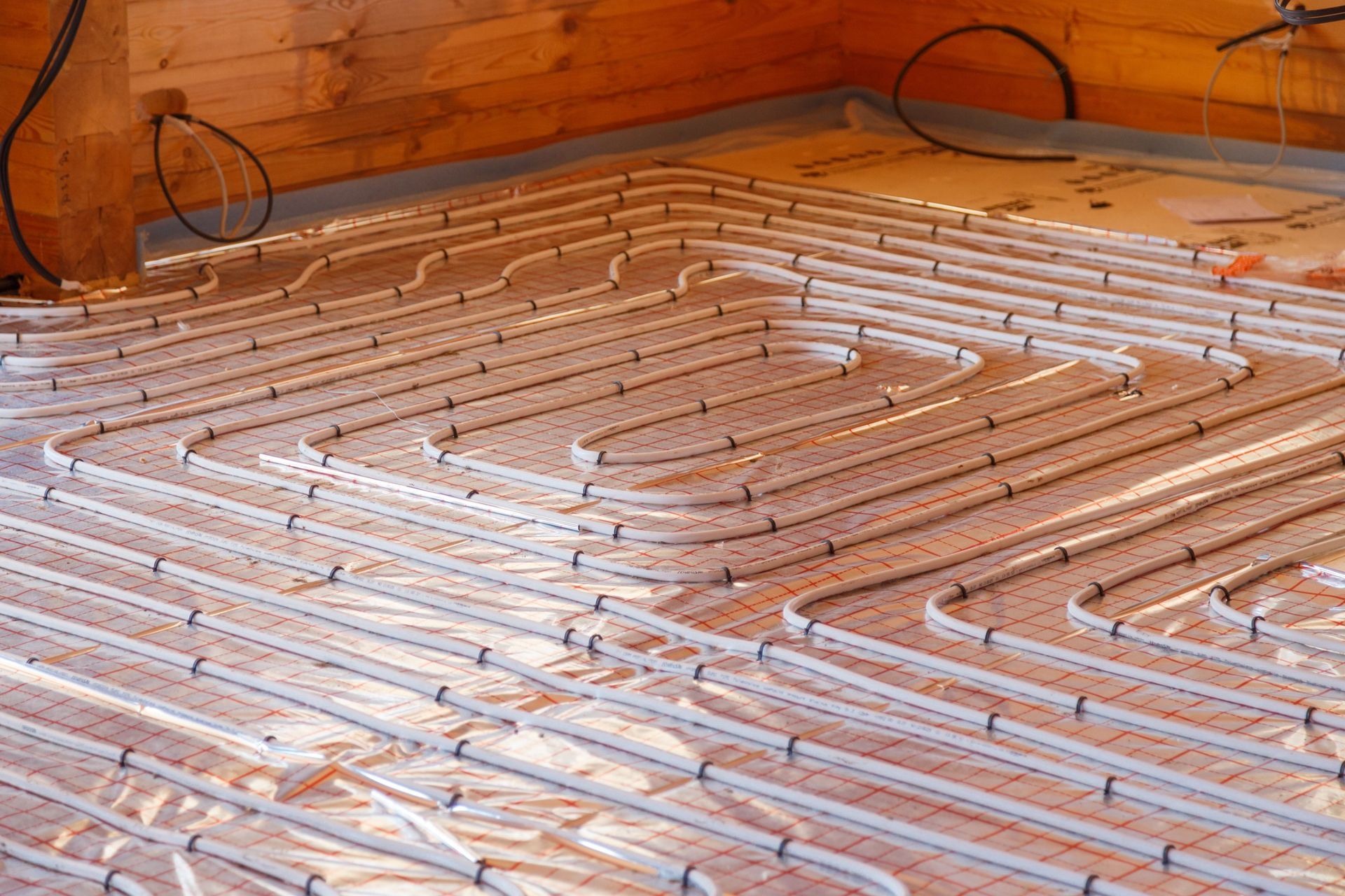 A close up of a floor heating system in a wooden house.