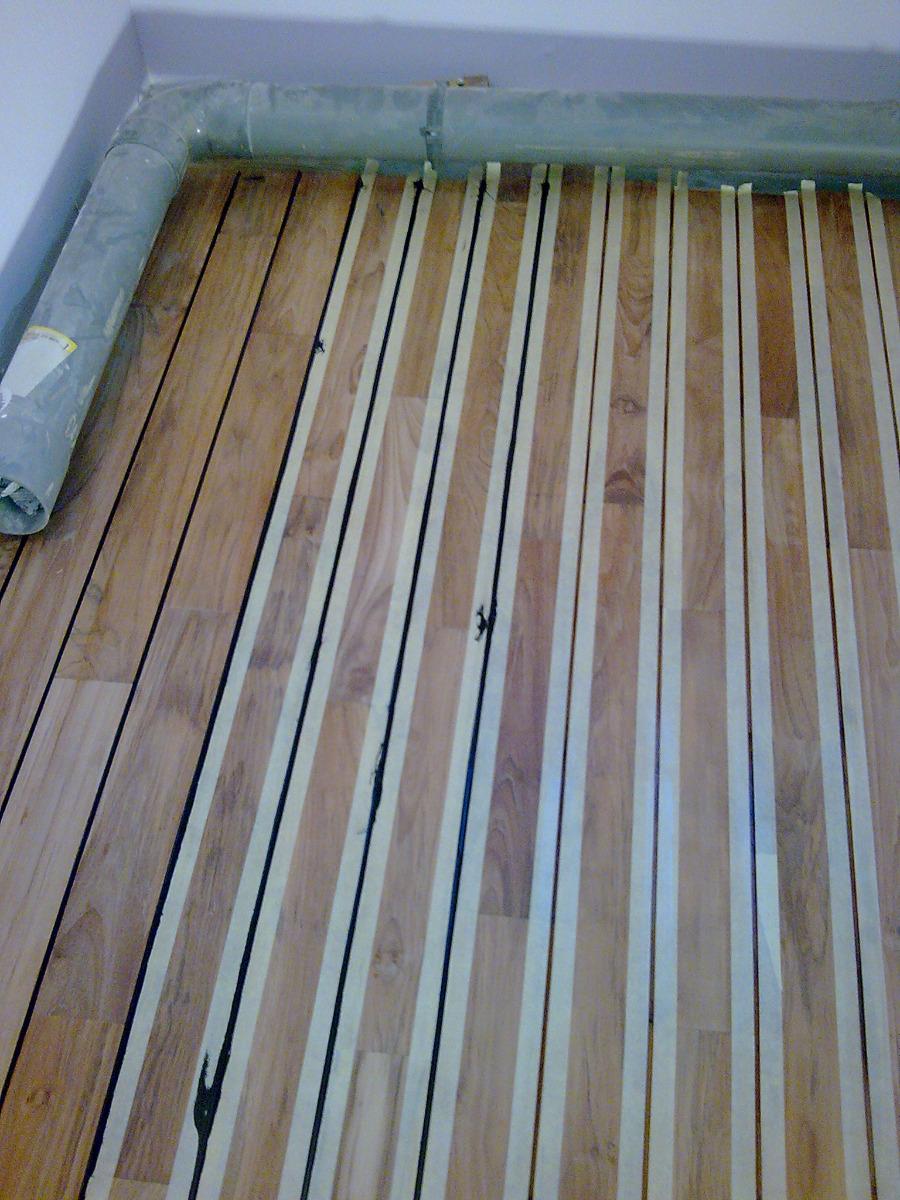 Pose d'un parquet pont de bateau Sarlat | Menuiserie Delort Agencement Dordogne