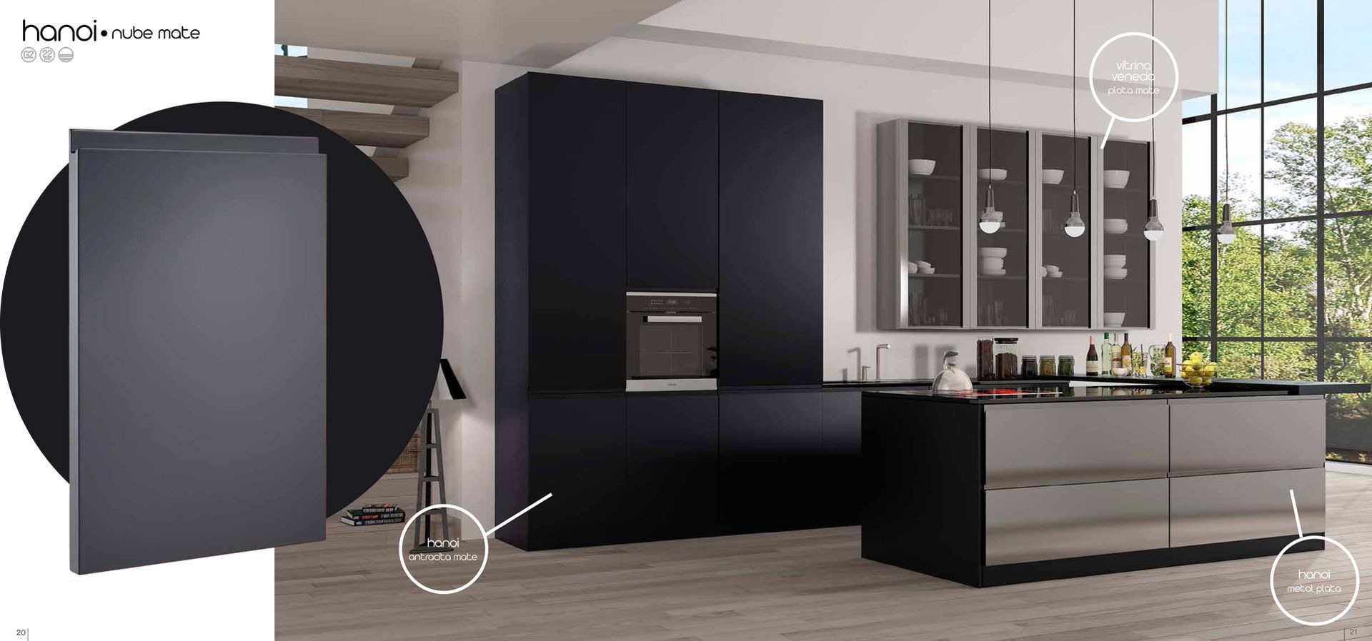 Una cocina con gabinetes negros y un refrigerador negro.