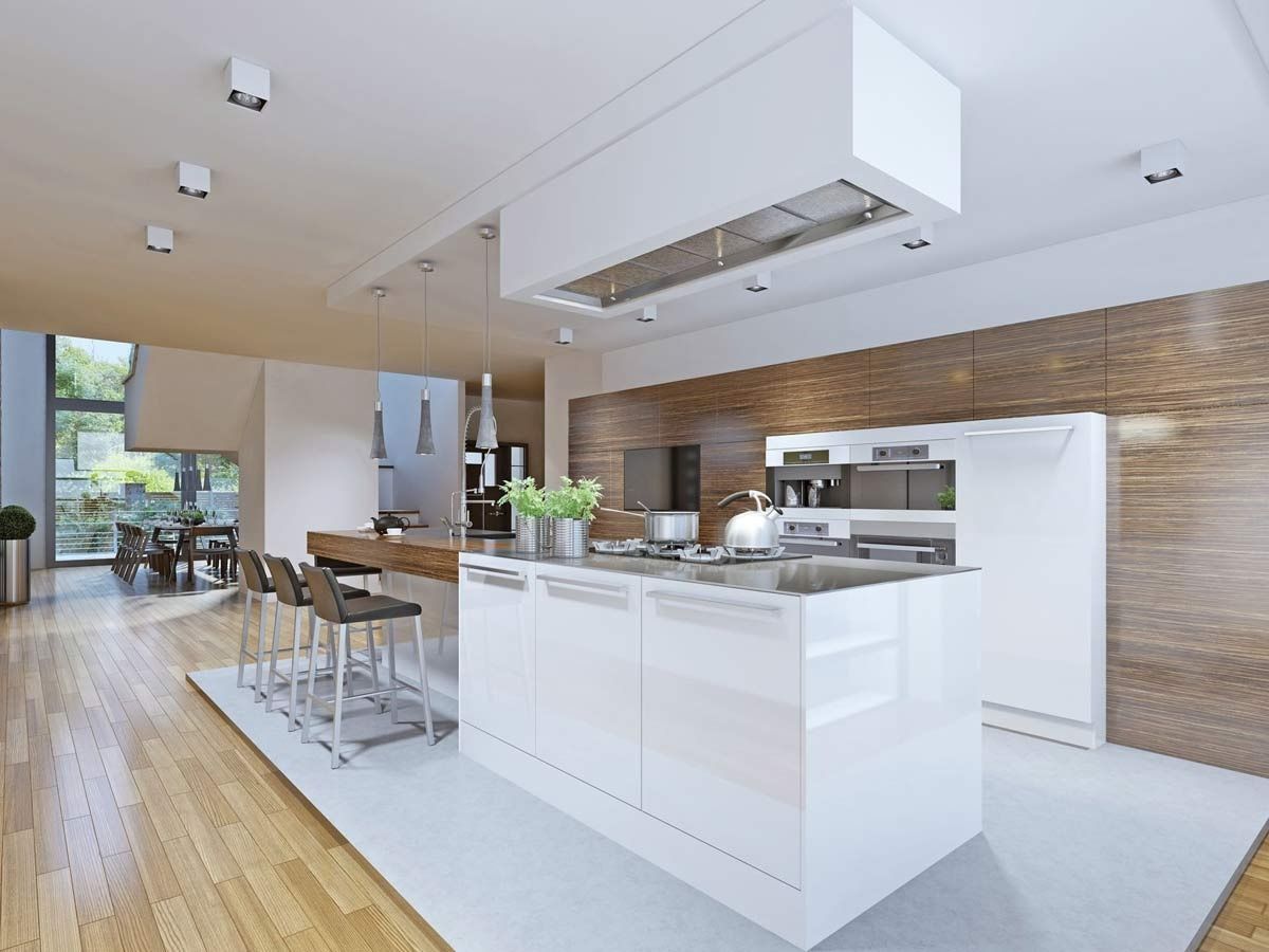 Una cocina moderna con una gran isla en el medio.
