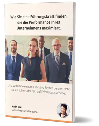 Eine Gruppe von Menschen in Anzug und Krawatte steht nebeneinander.