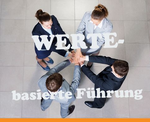 Four people in suits with hands together, text