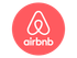 Sandton Accommodation Airbnb logo, white stylized "A" symbol inside a red circle.