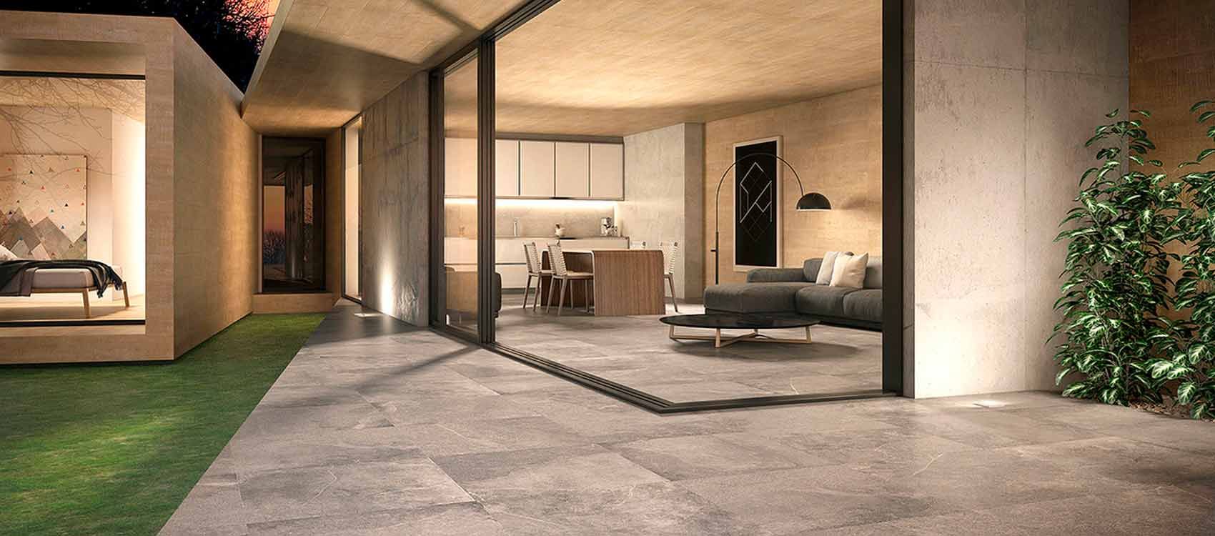 Impresión artística de una casa moderna con puertas corredizas de vidrio que conducen a una sala de estar y una cocina.