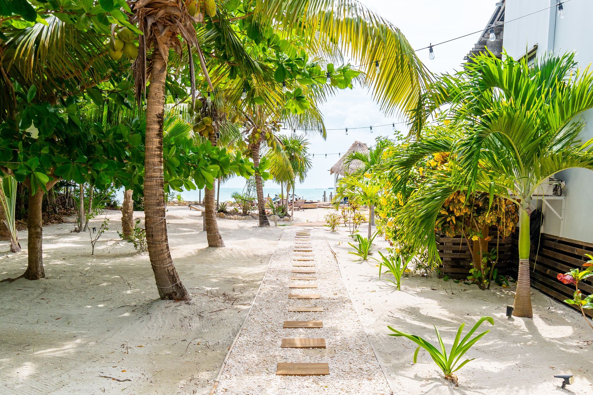 Luxury oceanfront villa at Secret Beach, Belize during a bright day.