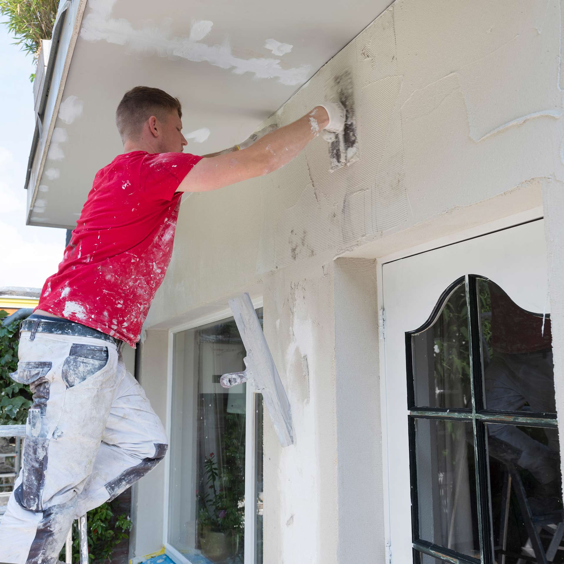 Peintre en bâtiment en action