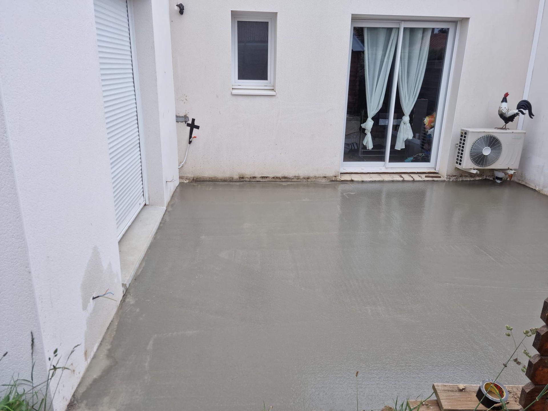 Terrasse en béton coulée sur des armatures