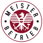 A red and white logo for meister betrieb