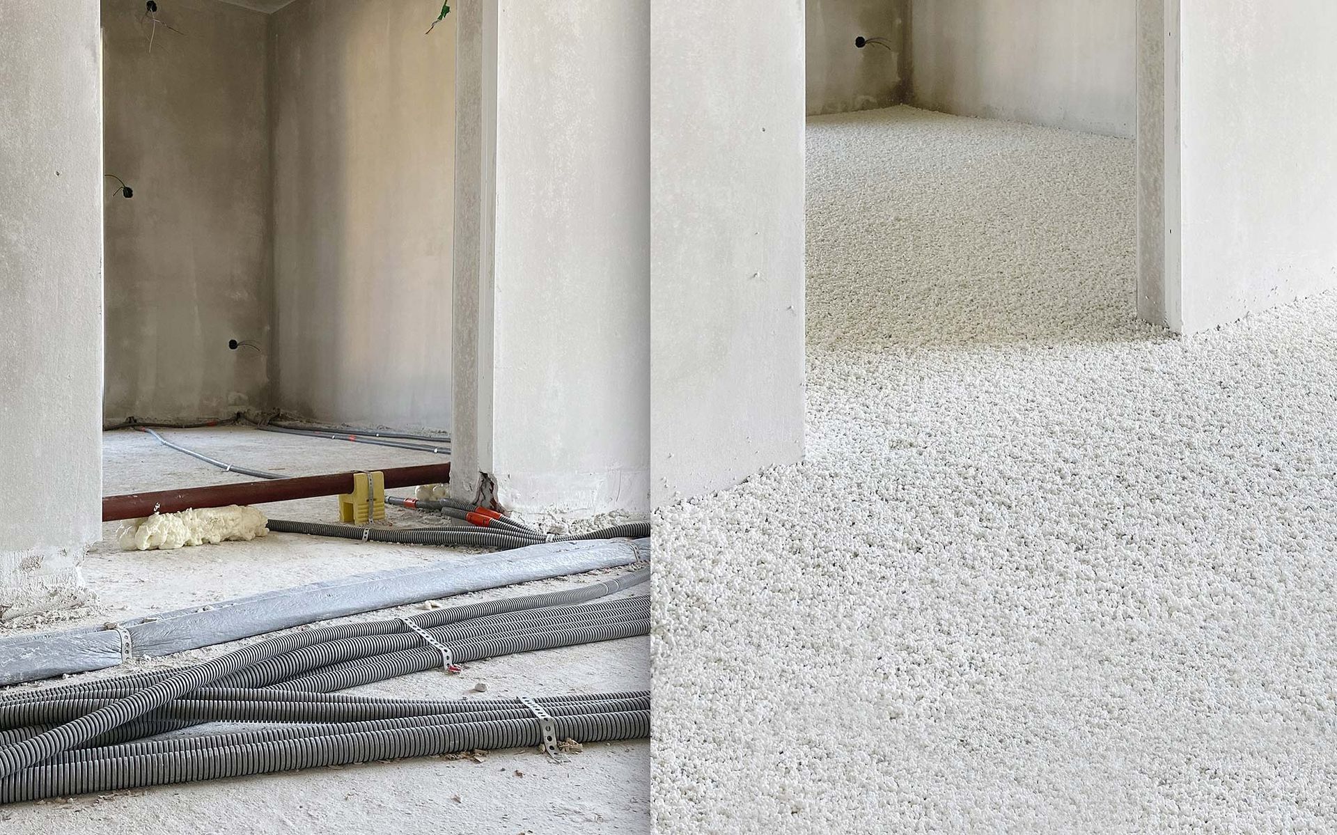 Ein im Bau befindliches Gebäude mit vielen Kabeln auf dem Boden.