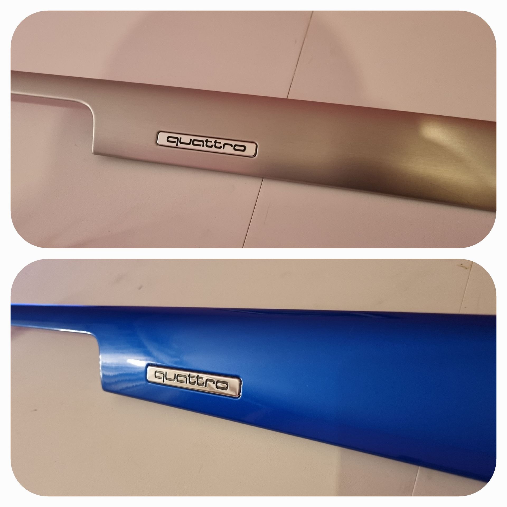 Deux pièces de garniture de voiture, argent et bleu, chacune avec l'emblème « Quattro ».