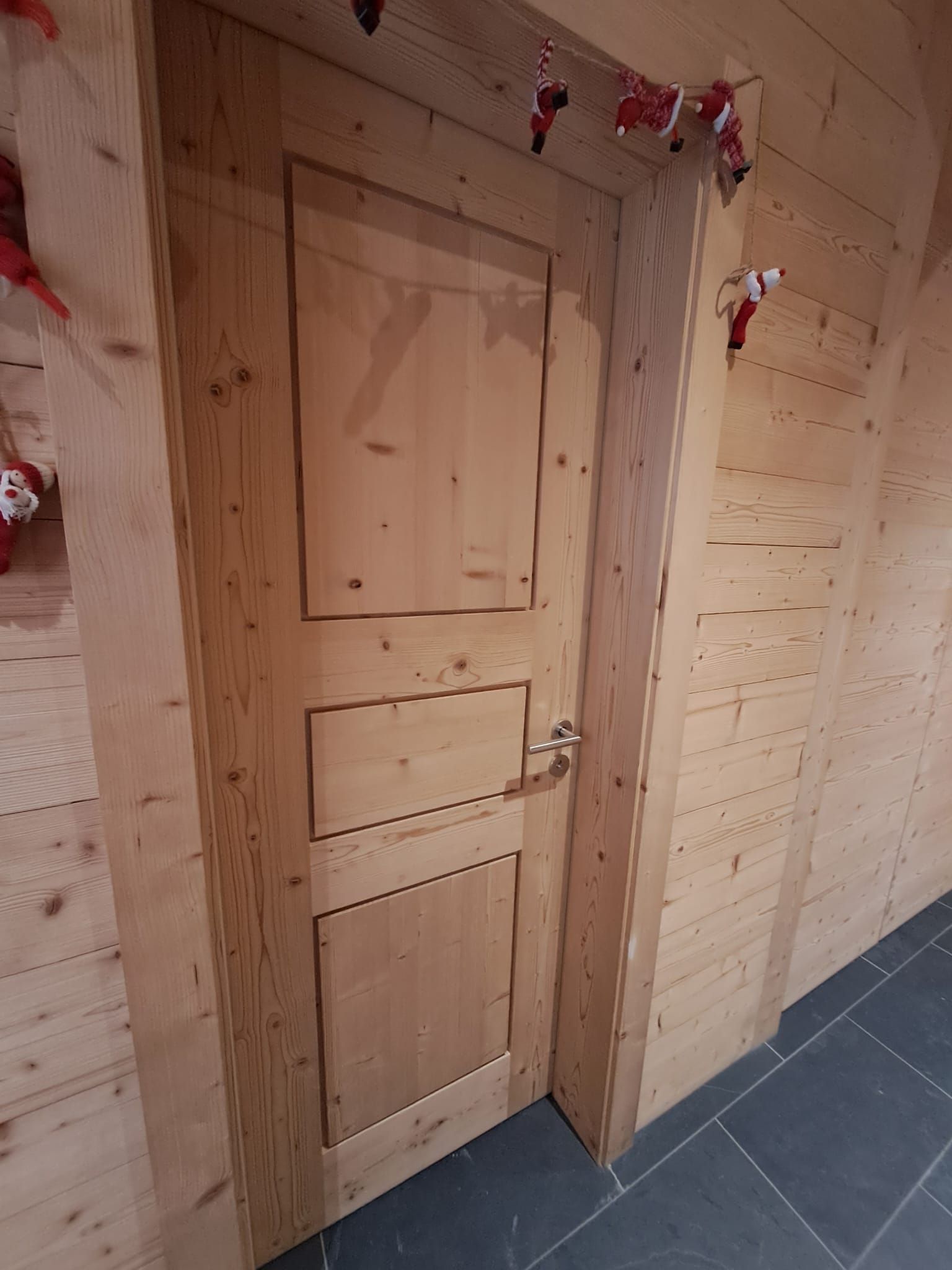 Porte assemblée en sapin vapo brossé