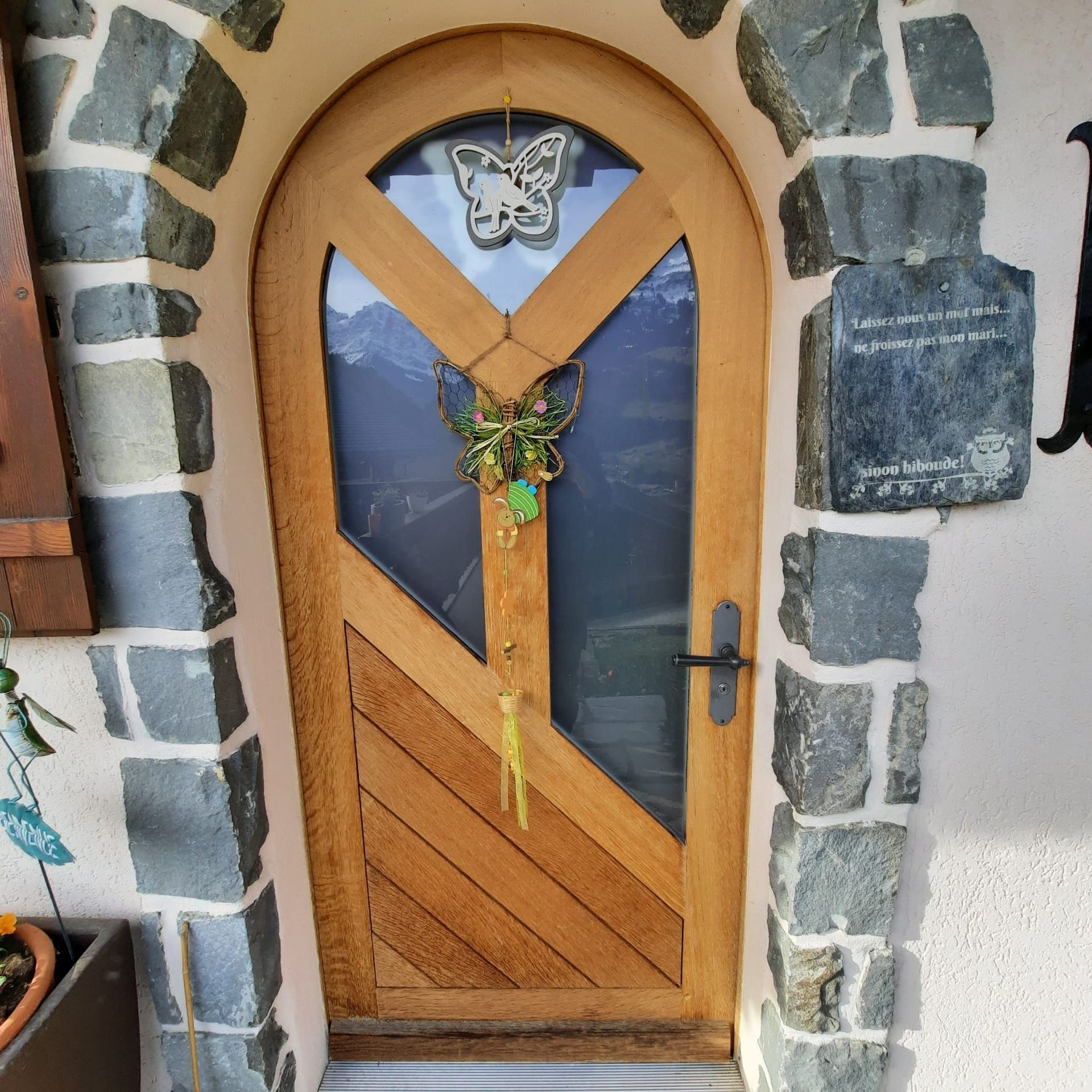 Porte d'entrée arrondie en chêne