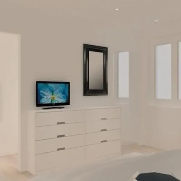 Una cómoda blanca con un pequeño televisor y un espejo con marco negro se encuentra contra una pared