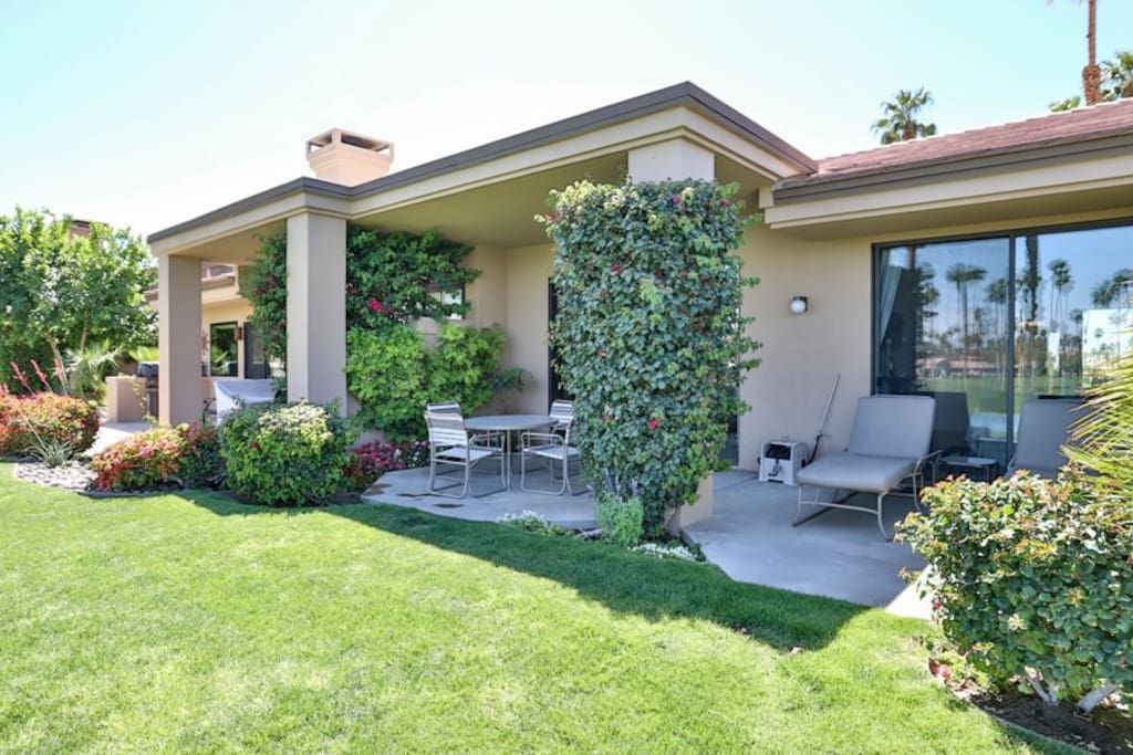 A house with a large lawn in front of it- California- Trip- Summer